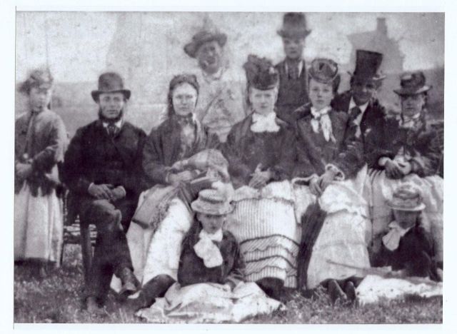 Charlotte Bertha sitting on floor